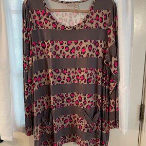 Logo by Laurie Goldstein tunic